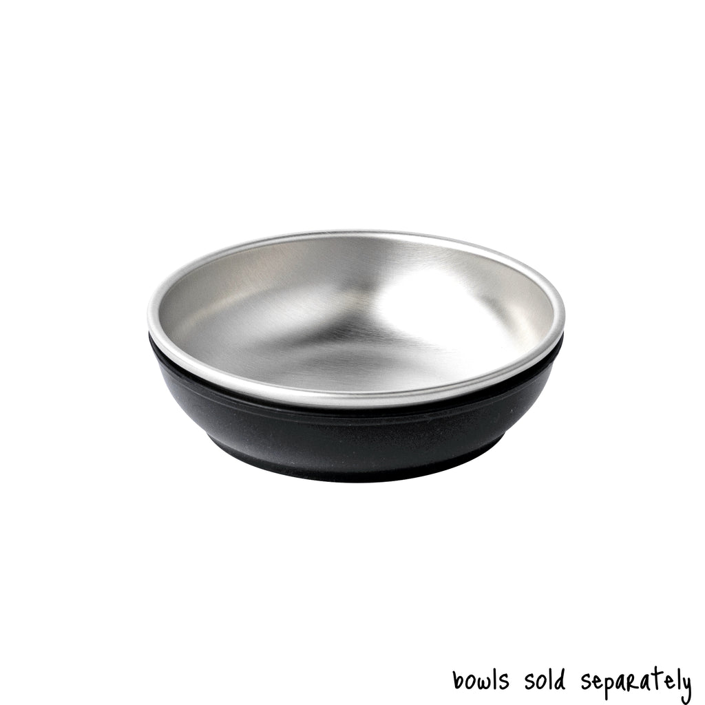 A single size small Basis Pet stainless steel dog bowl (same as the cat bowl) in a black bowl cozy. Text reads "bowls sold separately".