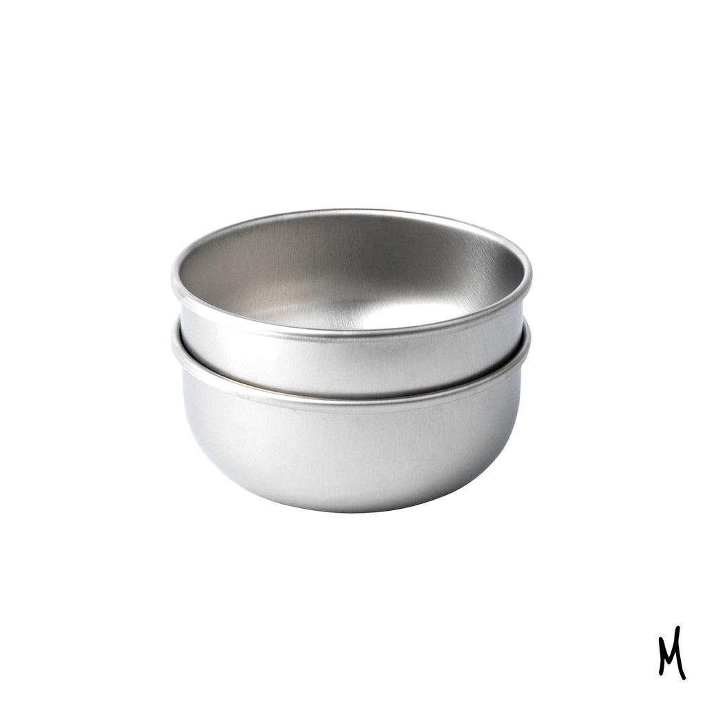 A stack of 2 medium size Basis Pet stainless steel dog bowls.