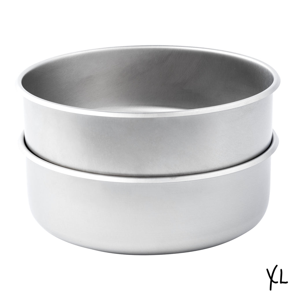 A stack of 2 extra large size Basis Pet stainless steel dog bowls.