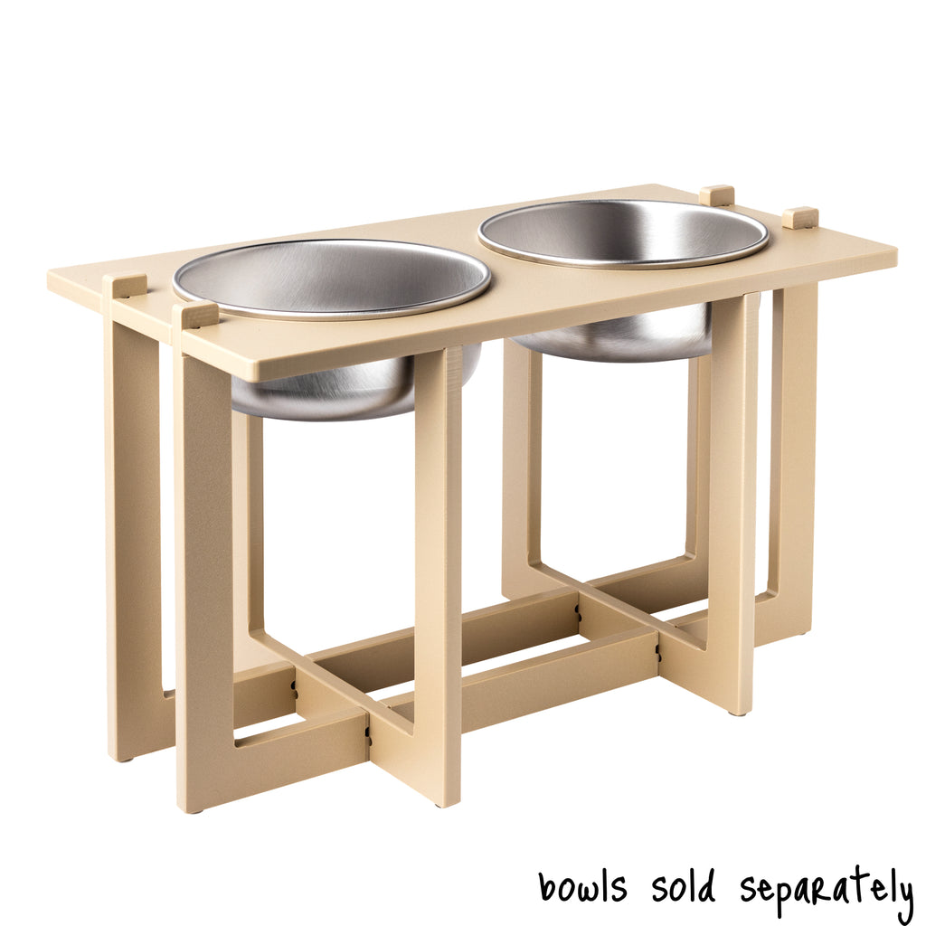 A double bowl Rise Pet Bowl Stand for large dog bowls, high rise height. Text reads "bowls sold separately".