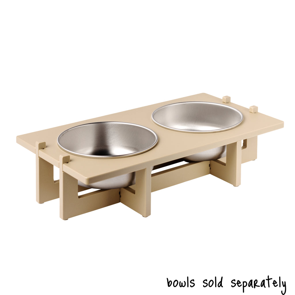 A double bowl Rise Pet Bowl Stand for large dog bowls, low rise height. Text reads "bowls sold separately".