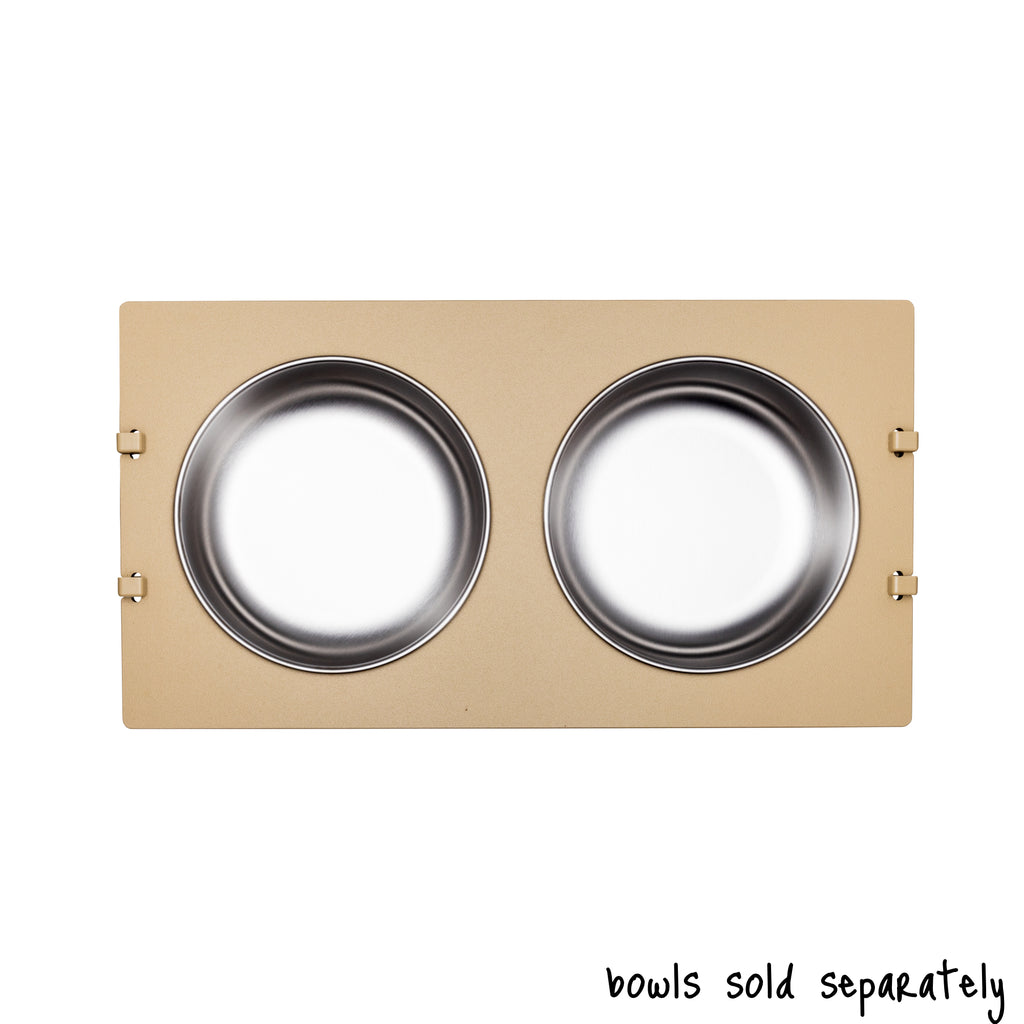 A double bowl Rise Pet Bowl Stand for large dog bowls shown from above. Text reads "bowls sold separately".